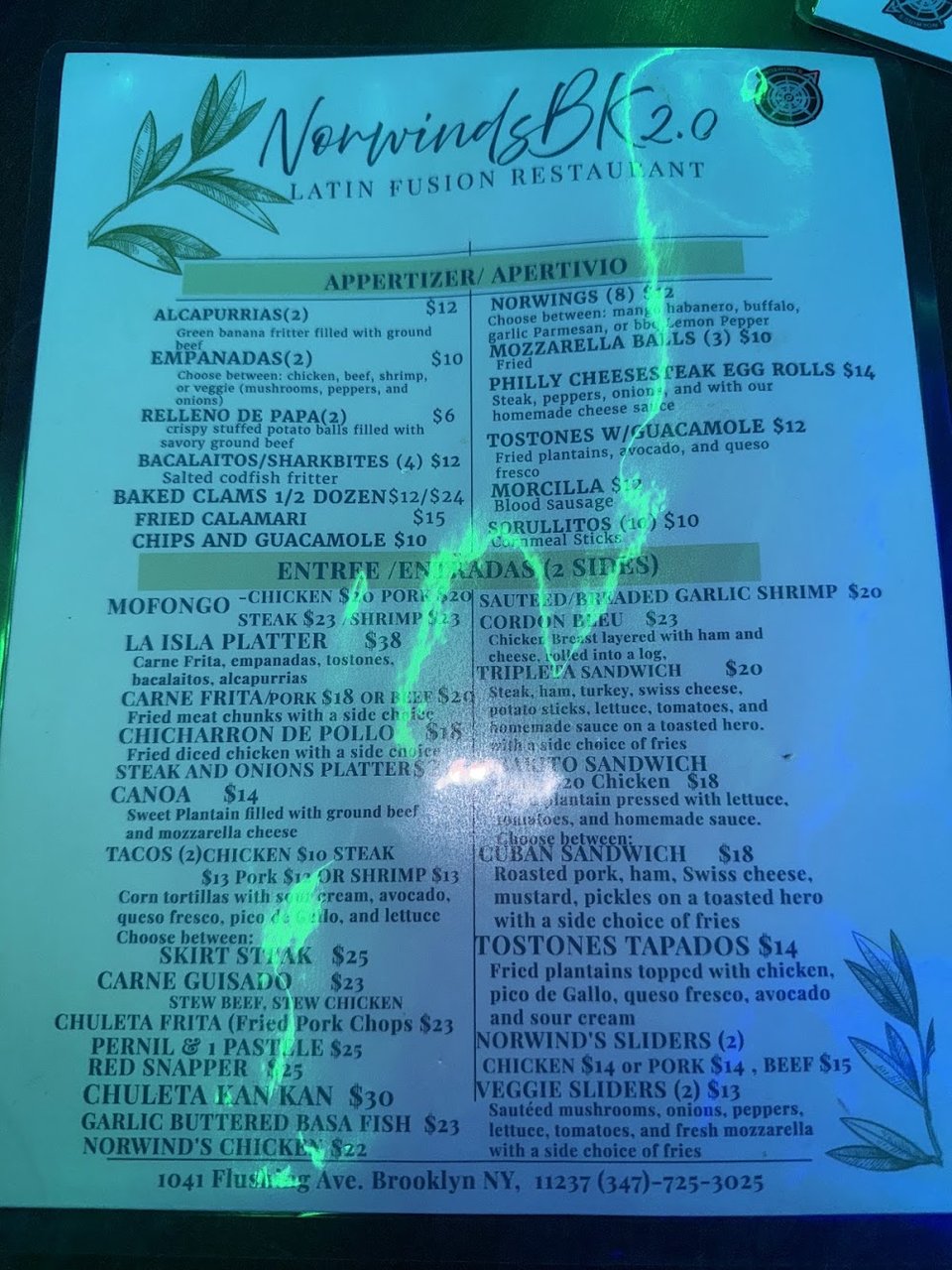 Food and drink menu with Cuban sandwich and sangria.